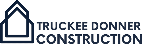 The image shows the logo of Truckee Donner Construction, featuring the company's name in dark blue letters next to a simple house outline.